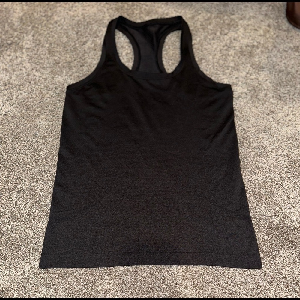 Lululemon black size 6 racerback swiftly tank.